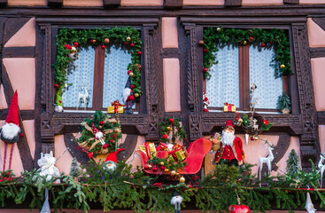 Fototapeta na wymiar Christmas decorations in the Christmas Market, Riquewihr⁩, Alsace, France