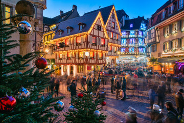 Christmas decorations in the Christmas Market, Colmar, Alsace, France - obrazy, fototapety, plakaty