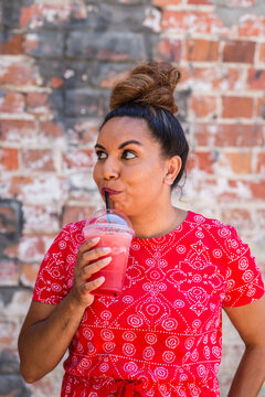 woman with watermelon smoothie