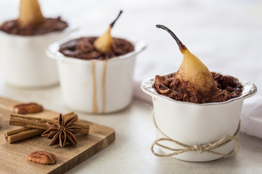 Three Baked Chocolate Pear Dessert in ramekins