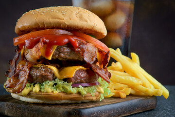 Delicious fresh Burger with French fries and Cola