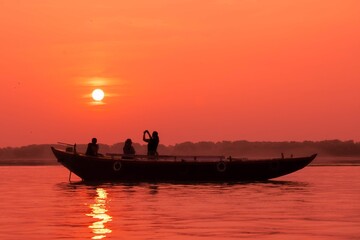Beautiful sunrise as seen from the on the Ganga river in Varanasi, India 