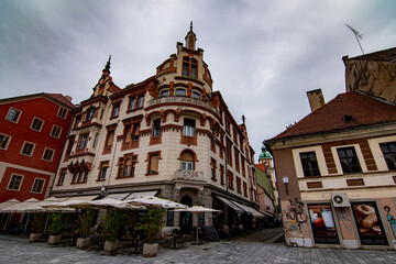 Maribor main square reataurant, beautiful architecture in a cloudy day