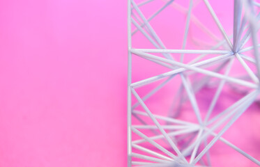 3D printed structure. Networked structure against a pink background. Vernetze Netz Struktur vor rosa Hintergrund. 3D gedruckte Struktur.