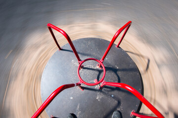 small merry-go-round in a playground