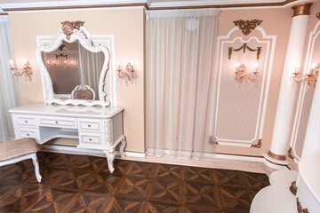 Fototapeta na wymiar small luxury bedroom with bath and expensive furniture in a chic old baroque style.