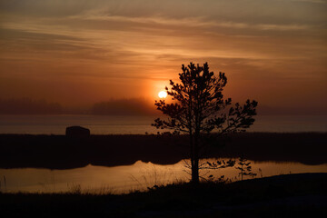 Fototapeta na wymiar Sunrise on the White Sea in Karelia, Russia