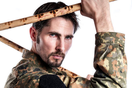 Self defense instructor with bamboo sticks