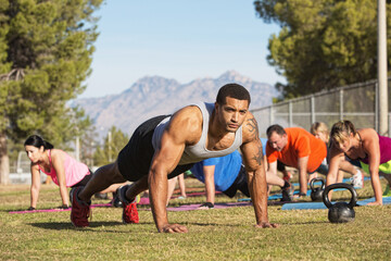 People Working Out Near Mountains