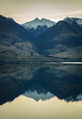 Calm mountain reflections in lake Wanaka New Zealand