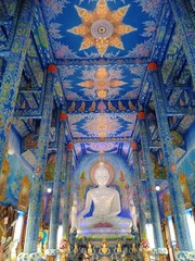 White buddha statue in temple at chiangrai Thailand