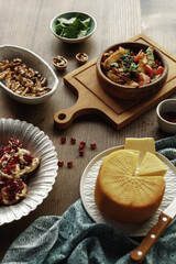 dishes and snacks of traditional Caucasian Georgian cuisine. classic national serving on a rustic wooden table