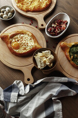dishes and snacks of traditional Caucasian Georgian cuisine. classic national serving on a rustic wooden table