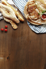 dishes and snacks of traditional Caucasian Georgian cuisine. classic national serving on a rustic wooden table