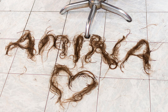 Abstract background of name Amina made by cut hair in salon