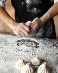 the process of cooking traditional Caucasian dishes. khinkali khachapuri.