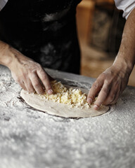 the process of cooking traditional Caucasian dishes. khinkali khachapuri.
