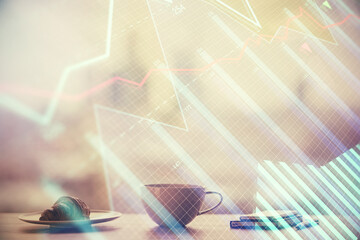 Double exposure of forex chart over coffee cup background in office. Concept of financial analysis...