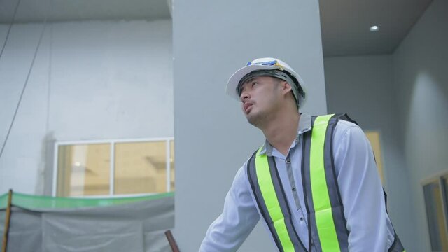 Engineer concept. Asian male employees are frustrated at work. 4k Resolution.