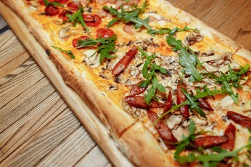 Pizza on wooden table top view. Fast food. Post blog social media. with copy space. Pizza ready to eat