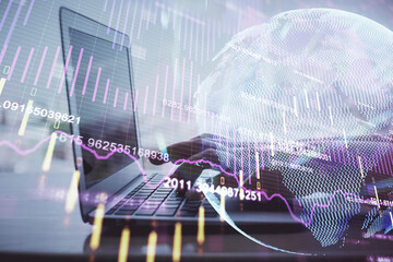 Double exposure of woman hands typing on computer and forex chart hologram drawing. Stock market analysis concept.