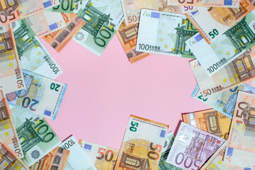 Obraz na płótnie Canvas a bunch of European paper euro bills as an element of a trading system