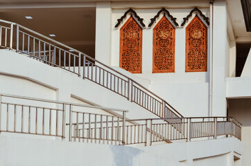 Naklejka premium Beautiful mosque architecture with carved on the windows and wall. Javanese and modern architecture. 