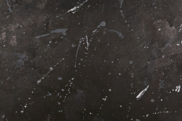 Gray paint background and white touches with relief
