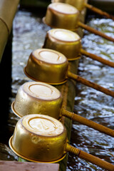 Description  Japanese water source and ladle for the purification of hands
