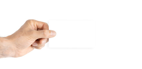 Fototapeta premium Business card mockup. Hand holding blank business paper card isolated on white background. Banner with copy space. Finger pointing.