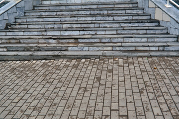 Close up stone steps texture. Close-up of steps covered with raindrops.