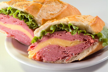 bologna sandwich with cheese and lettuce