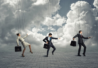 businessmen puppets