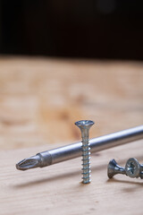Phillips head screwdriver and wood screws