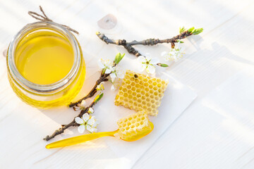 broken yellow honeycomb with honey on table. Honey products. healthy natural food concept
