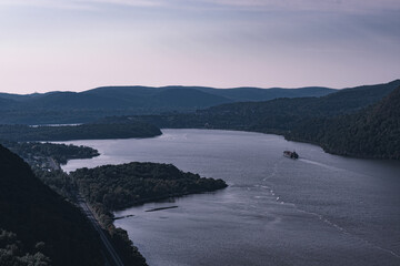 Cargo ship on the Lower Hudson River, as seen from the Breakneck Ridge hiking trail near Cold...