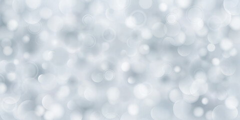 Abstract background of big and small translucent circles in gray colors with bokeh effect