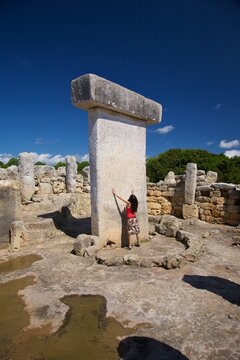 tourist adoring taula