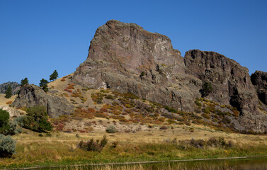 Outcroppings along the Missouri River in Western Montana, with the brush showing autumn colors.