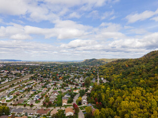 Landscape aerial photo overlooking the bluffs and city of La Crosse Wisconsin during peak fall as...