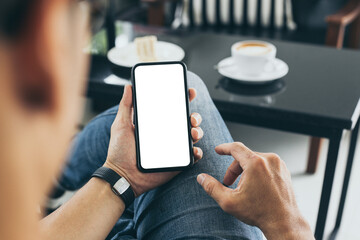 cell phone mockup blank white screen.woman hand holding texting using mobile on desk at coffee shop.background empty space for advertise.work people contact marketing business,technology