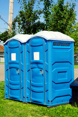 Portable toilets on grass