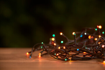 Christmas lighted light cord with different colored lights shining