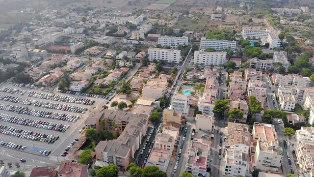 Aerial Over Residential Apartments And Streets In Majorca. Follow Shot