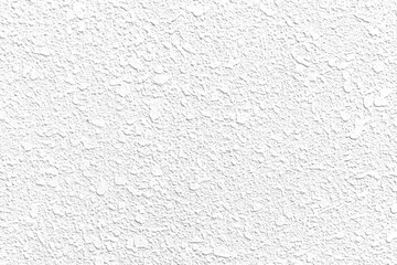 Rough patterned white cement wall texture and seamless background