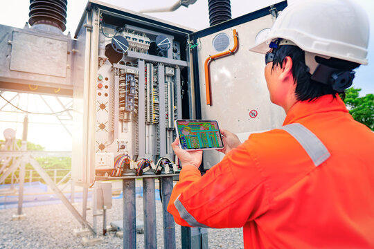 Electrical engineers are scanning temp to check for faults in equipment sets, Also known as preventive maintenance to reduce the damage of equipment, Concept to professional engineer on industrial