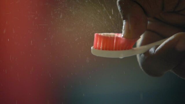 toothbrush cleaning spray of water sprinkel