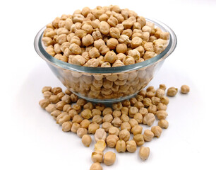 chickpeas in glass bowl on white background
