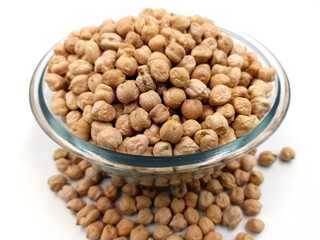 chickpeas in glass bowl on white background