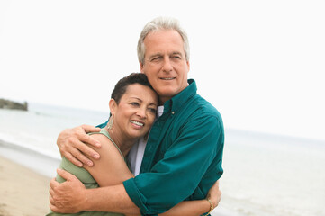 Couple Hugging on Beach